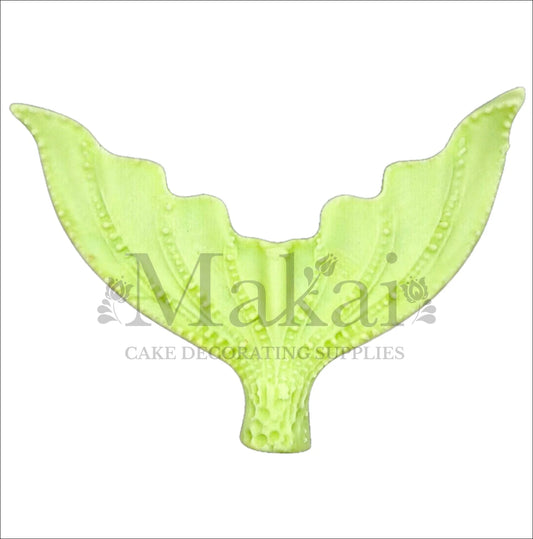 Large light green edible mermaid tail cake topper with textured details for fantasy or ocean-themed cakes.