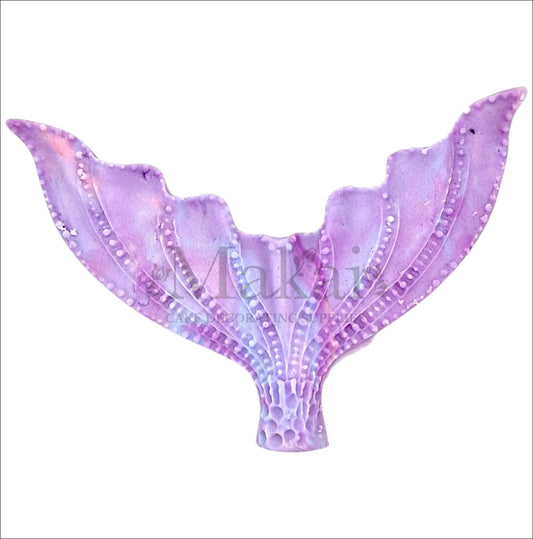 Edible large mermaid tail topper in purple and blue marble effect, perfect for ocean-themed cake decorations.