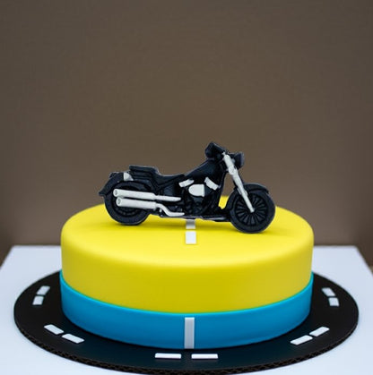 Motorbike cake decoration on yellow and blue fondant cake with road design – Makai Cake Decorating Supplies