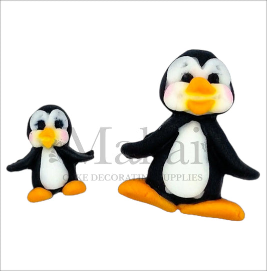 Cartoon penguin mother and baby cake toppers.