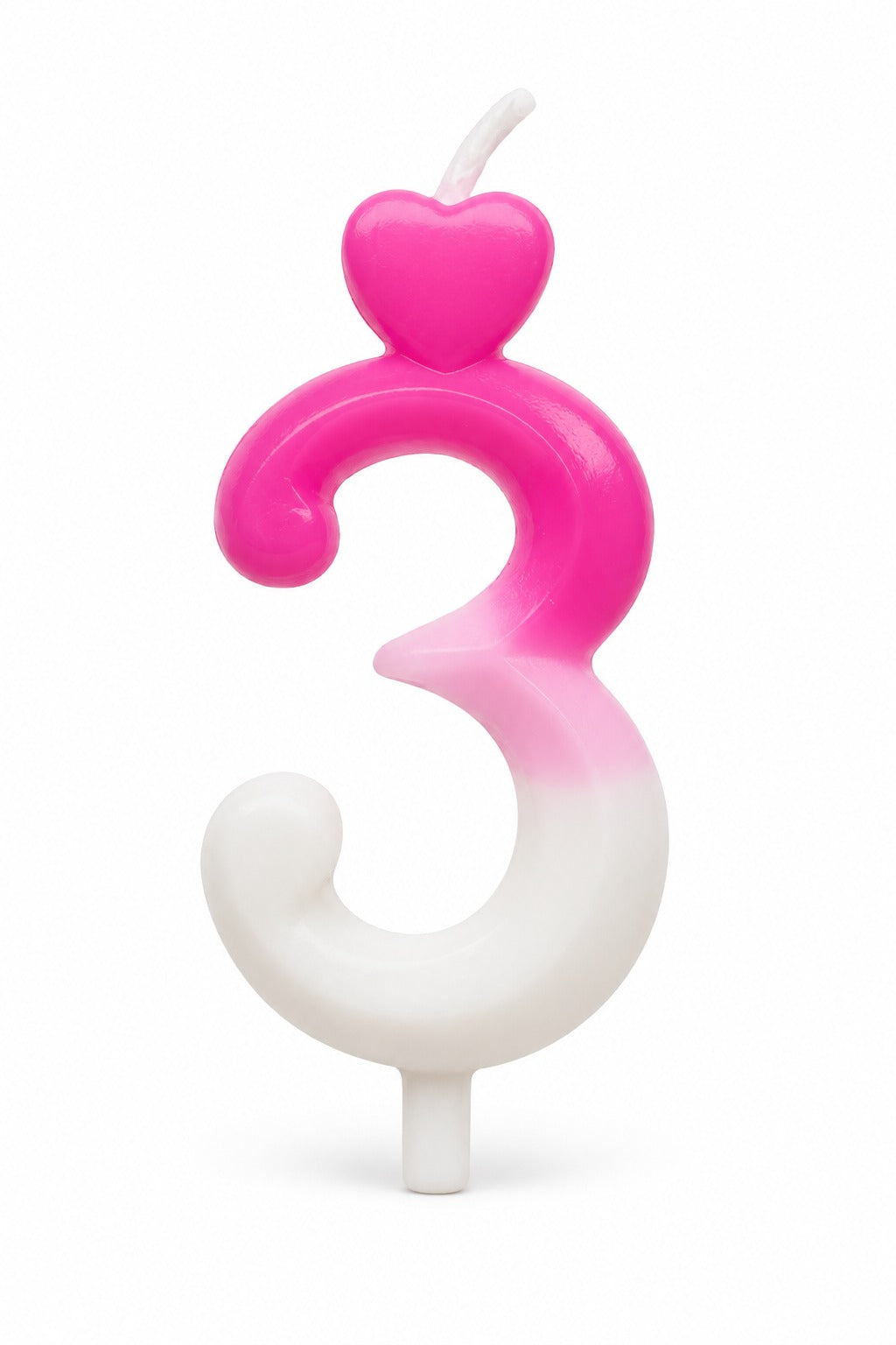 A novelty birthday candle shaped like the number 3, featuring a pink-to-white gradient body with a small pink heart on top and a white wick, shown on a plain white background.