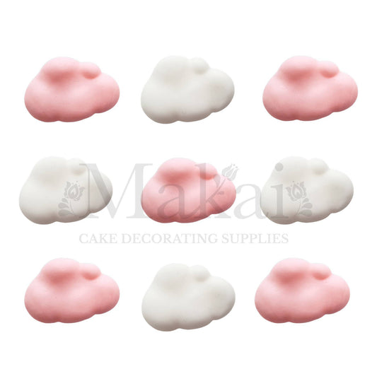Pink and white cloud cake toppers arranged on a clean white background, handmade decorations from Makai Cake Decorating Supplies
