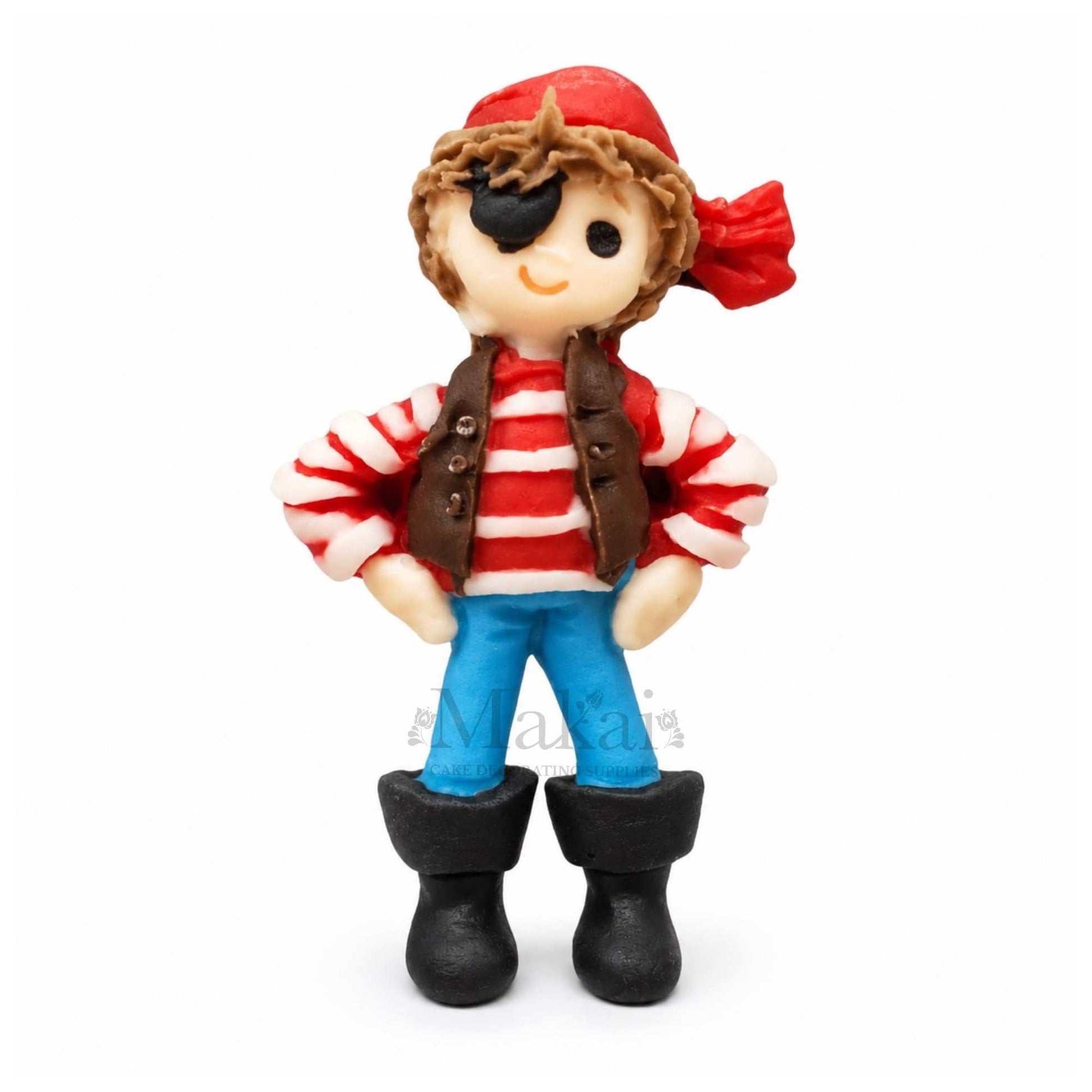 Handmade fondant pirate boy figure with eye patch for pirate themed cake decoration