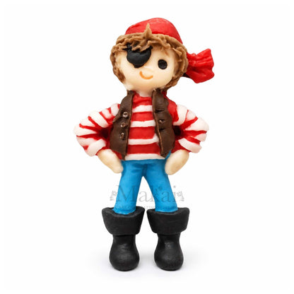 Handmade fondant pirate boy figure with eye patch for pirate themed cake decoration