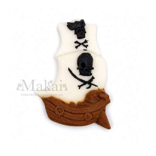 Edible pirate ship fondant cake topper with skull and crossbones design for treasure or adventure-themed cakes.