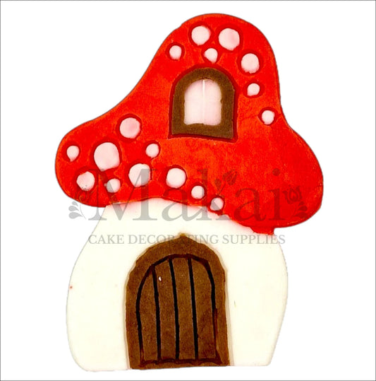 Edible red mushroom house cake topper – perfect for fairy tale or woodland-themed birthday cakes and magical celebrations.
