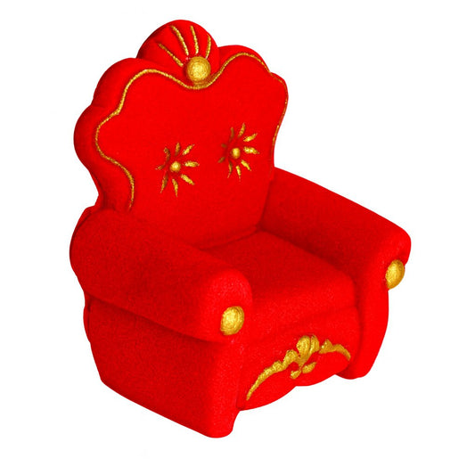 Red miniature rococo-style armchair cake topper with gold decorative details