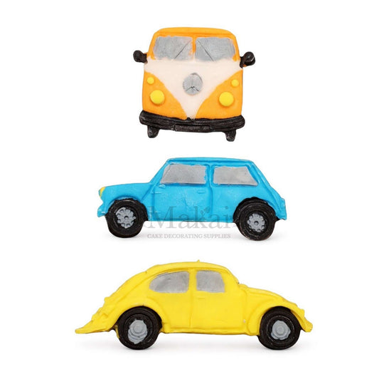 Set of three vintage car cake toppers: yellow camper van, blue Mini, yellow beetle.