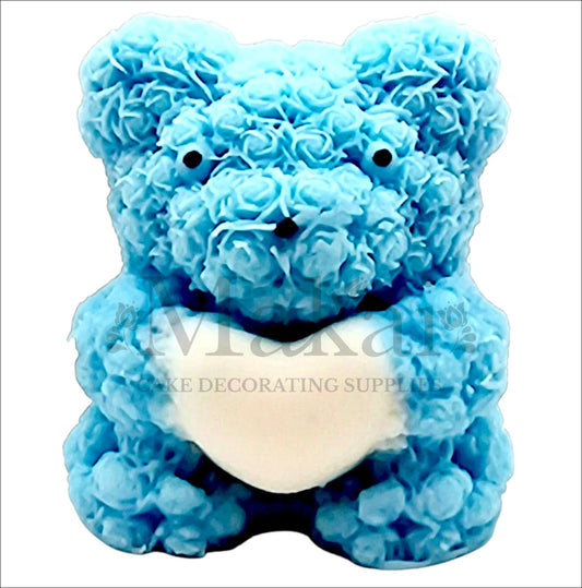 Blue rose bear edible cake topper with a white heart, perfect for baby showers and birthdays.