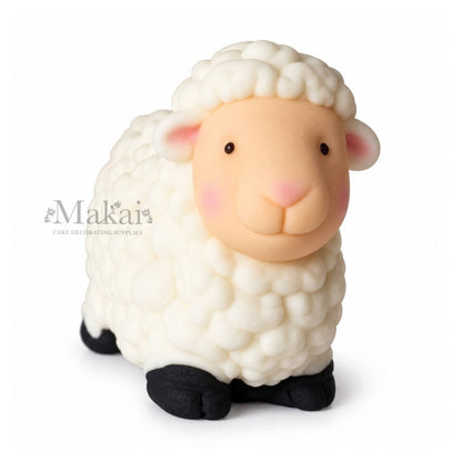 Large white sheep fondant cake topper with textured fleece for farm themed birthday cakes