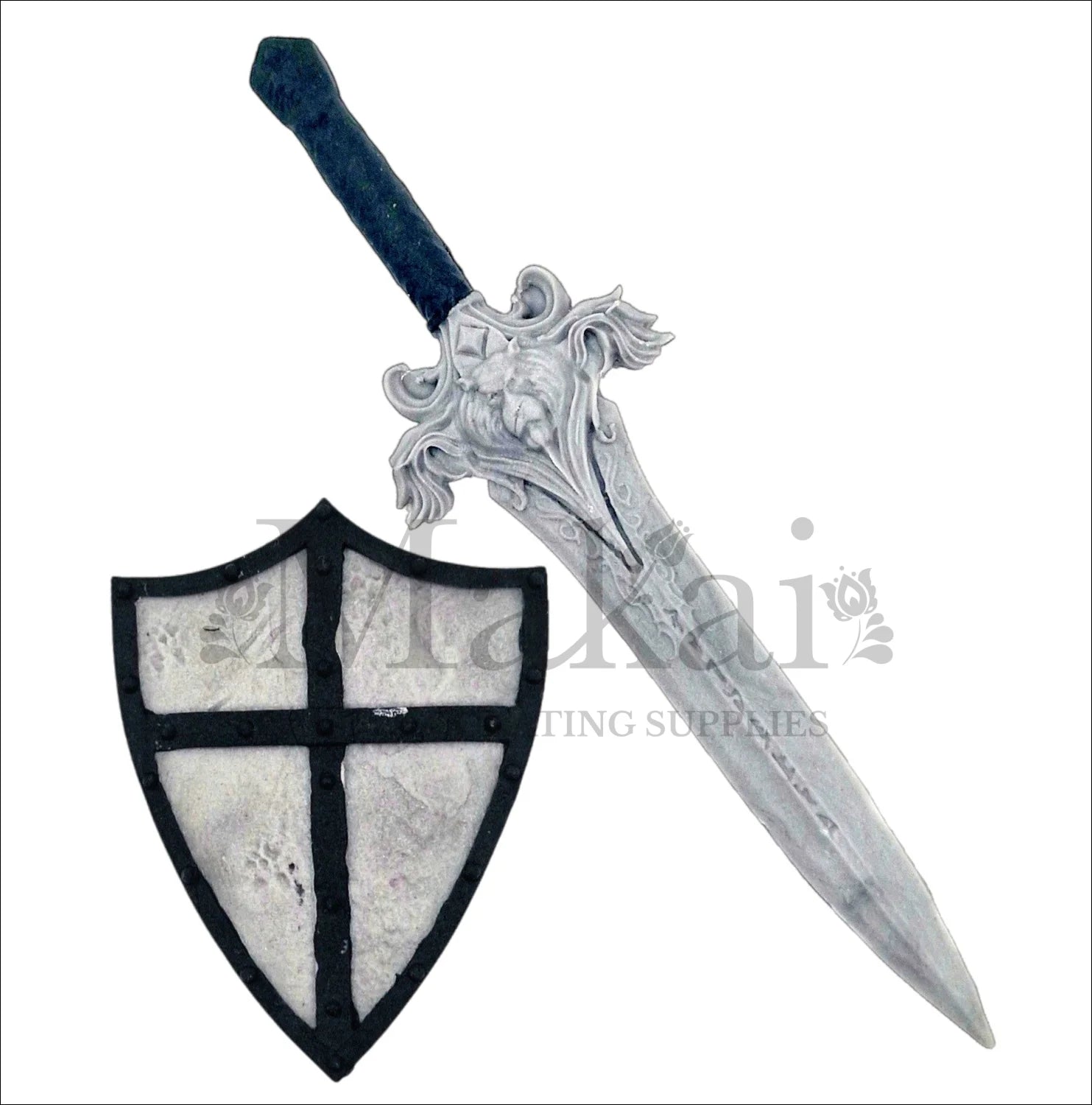 Edible sword and shield fondant cake toppers in medieval style for fantasy and adventure-themed cakes.