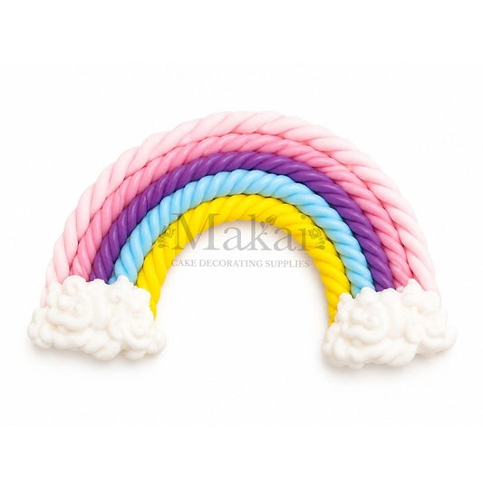 Edible pastel rainbow with clouds cake topper in yellow, blue, purple, and pink colours.