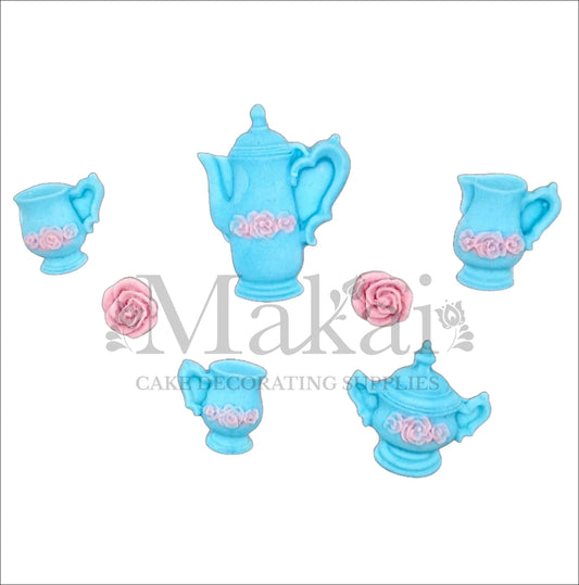 Edible vintage blue tea set cake toppers with pink rose details, including teapot, cups, and accessories.